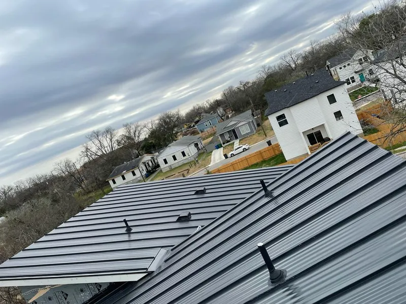 Standing seam metal roof panels with vents for Skylight Repair in Belvedere Park